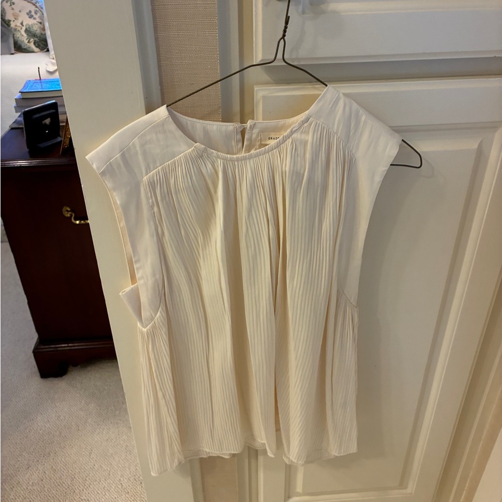 Chic Cream Sleeveless Blouse